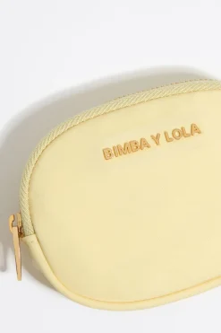 Shop BIMBA Y LOLA Monedero Ovalado Nylon Amarillo Claro