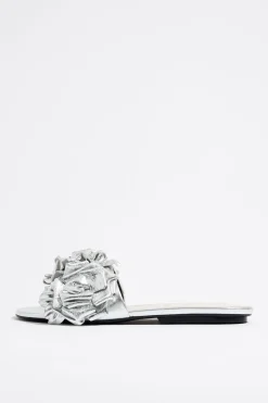 New BIMBA Y LOLA Sandalia Plana Flores Piel Plata